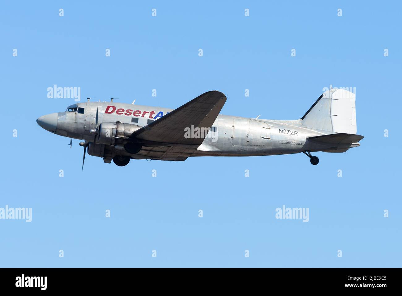 Desert Air Transport Douglas DC-3 classic aircraft registered N272R flying for cargo. One of the last airworthy DC3 airplane. Douglas DC-3C. Stock Photo