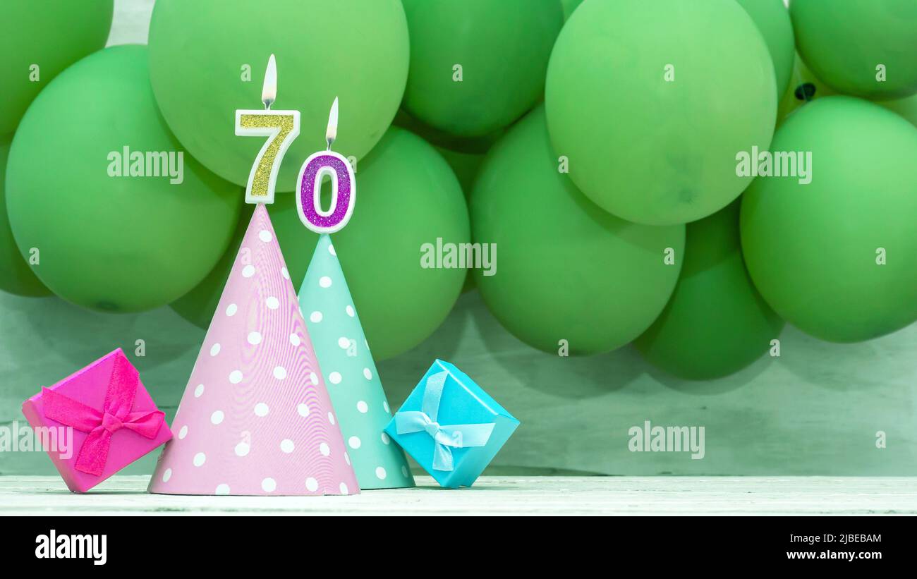 Birthday number, a beautiful card with balloons and numbers from candles, a happy birthday background for a girl. Stock Photo