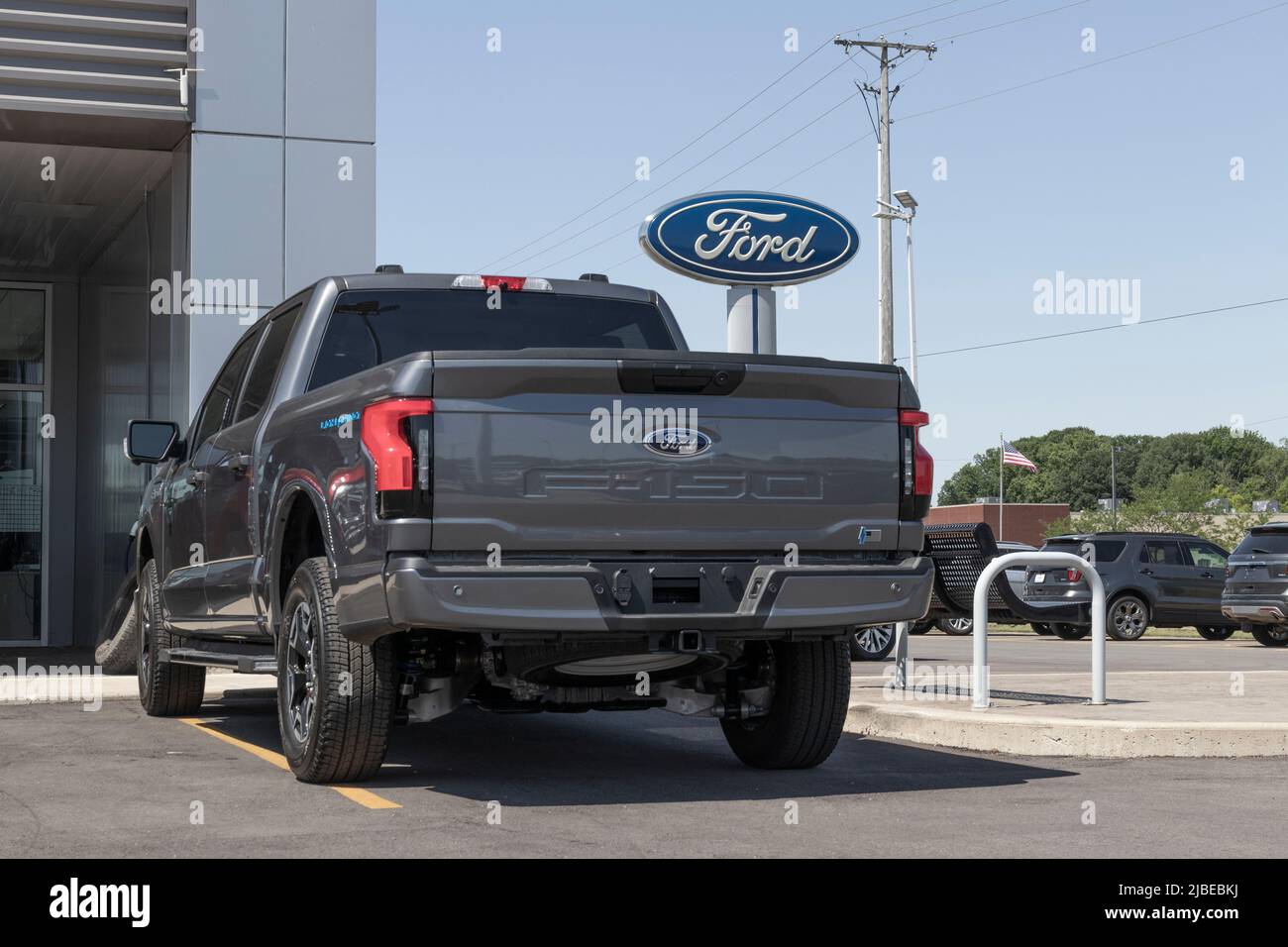 Marion - Circa June 2022: Ford F-150 Lightning display. Ford offers the F150 Lightning all-electric truck in Pro, XLT, Lariat, and Platinum models. Stock Photo