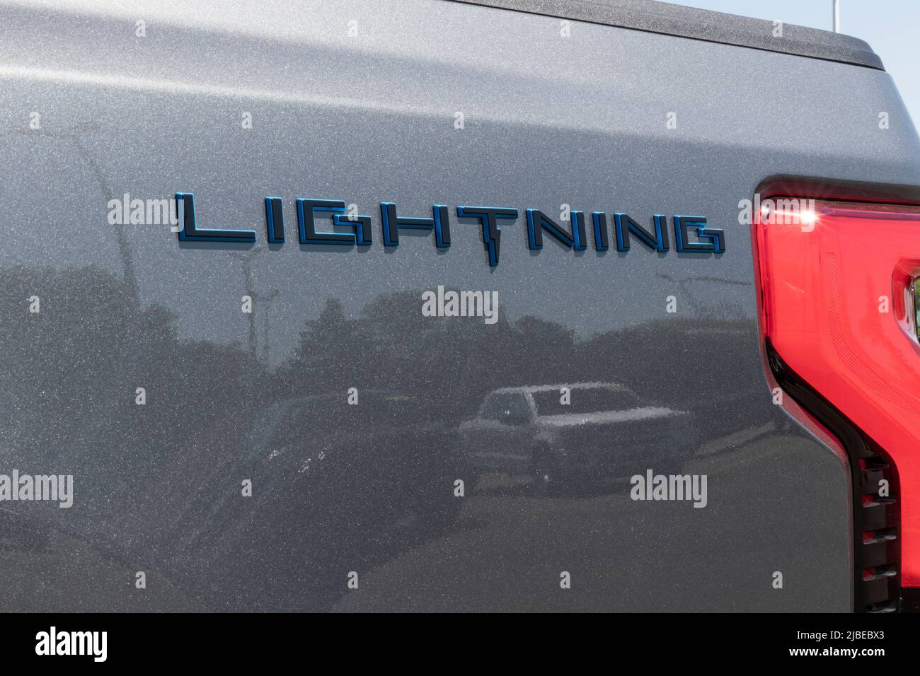 Marion - Circa June 2022: Ford F-150 Lightning display. Ford offers the F150 Lightning all-electric truck in Pro, XLT, Lariat, and Platinum models. Stock Photo