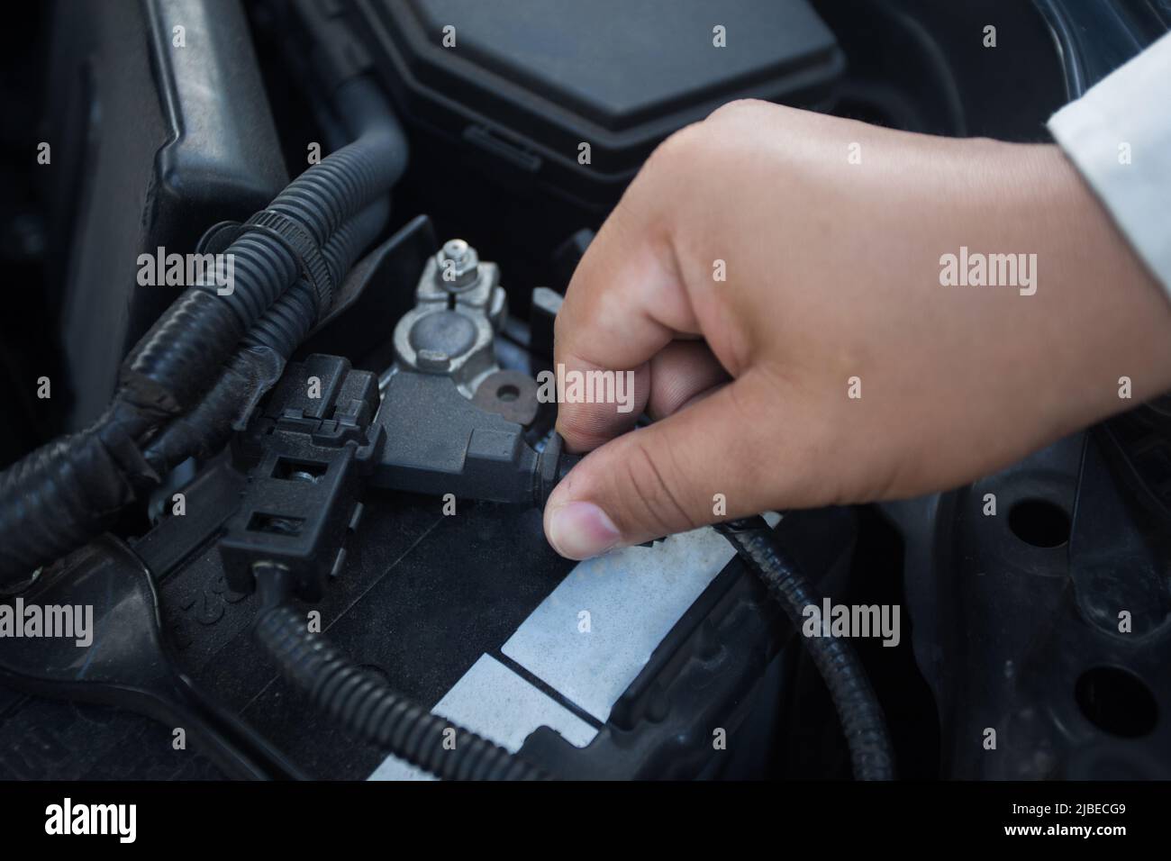Check the polarity of car batteries always available Stock Photo Alamy