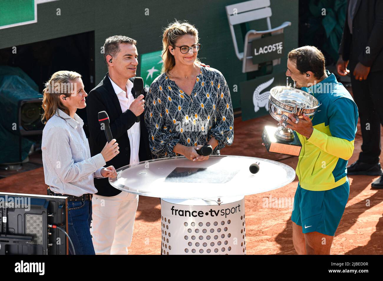 Paris, France - 05/06/2022, Rafael 'Rafa' Nadal of Spain with the trophy is interviewed by the French television channel 'France Televisions' ('France TV Sport', 'France 2') with Justine Henin, Laurent Luyat and Mary Pierce after the French Open final against Casper Ruud, Grand Slam tennis tournament on June 5, 2022 at Roland-Garros stadium in Paris, France - Photo Victor Joly / DPPI Stock Photo