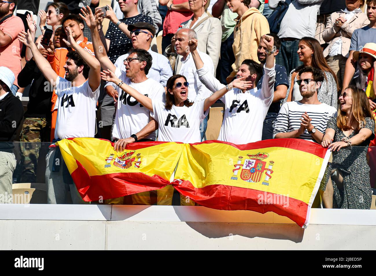 Paris, France - 05/06/2022, Spectators (fans, supporters) show their  support for Spain's Rafael Nadal with Spanish flags and "Vamos Rafa"  written on their tee-shirt during the French Open final between Rafael Nadal