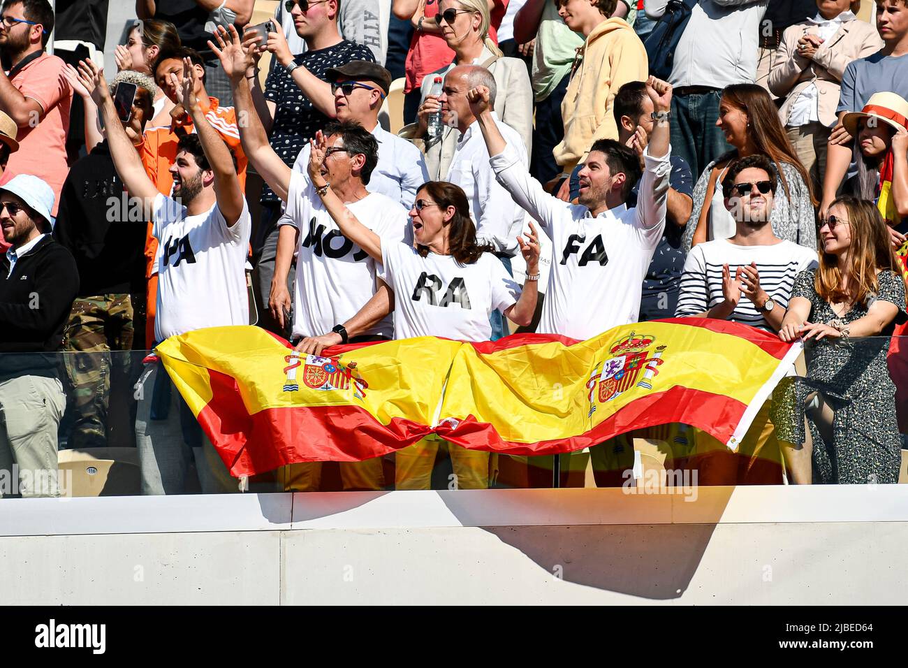 Paris, France - 05/06/2022, Spectators (fans, supporters) show their  support for Spain's Rafael Nadal with Spanish flags and "Vamos Rafa"  written on their tee-shirt during the French Open final between Rafael Nadal