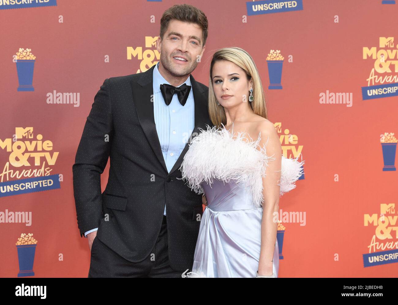 Los Angeles, USA. 02nd June, 2022. (L-R) Chris Tamburello and Lilianet  Solares arrives at the 2022 MTV Movie & TV Awards: UNSCRIPTED held at the  Barker Hangar in Santa Monica, CA on