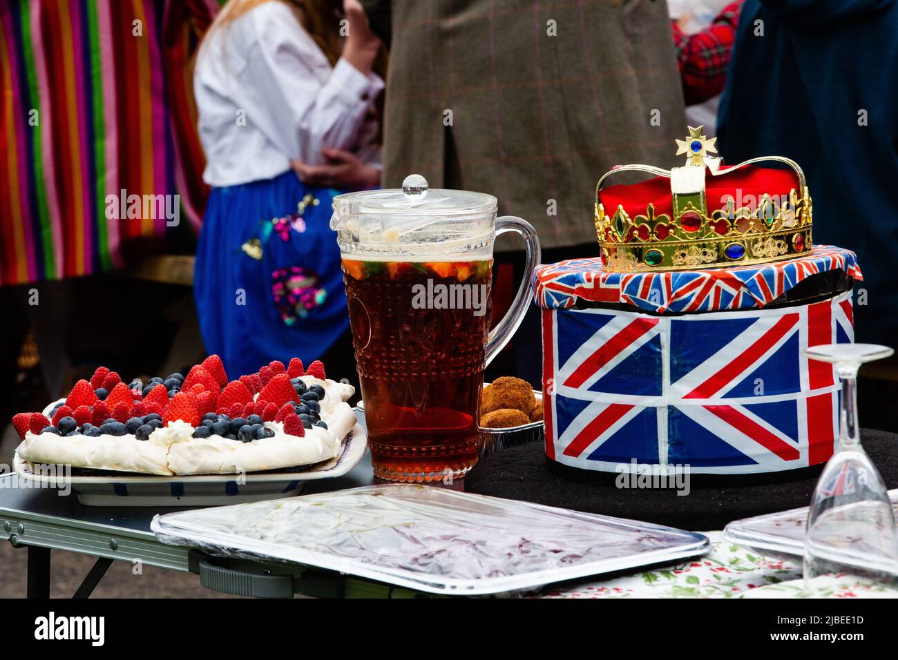 Windsor, UK. 5th June, 2022. A meringue, a jug of Pimms and a crown are