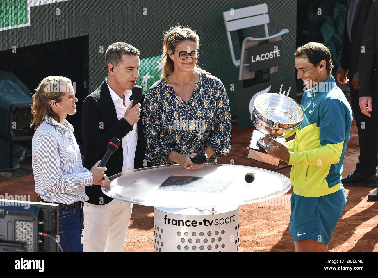 Paris, France - 05/06/2022, Rafael 'Rafa' Nadal of Spain with the trophy is interviewed by the French television channel 'France Televisions' ('France TV Sport', 'France 2') with Justine Henin, Laurent Luyat and Mary Pierce after the French Open final against Casper Ruud, Grand Slam tennis tournament on June 5, 2022 at Roland-Garros stadium in Paris, France - Photo: Victor Joly/DPPI/LiveMedia Stock Photo