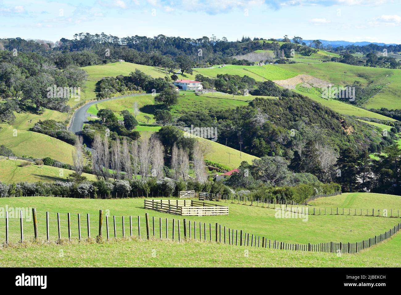 Former homestead of Scandrett family surrounded by farmland in what is now Scandrett Regional Park. Location: Mahurangi East New Zealand Stock Photo