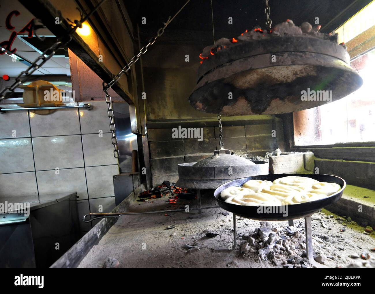A traditional Sač oven in Bosnia. Bosnians use this oven for baking the Burek ( Pita ) and meat dishes. Stock Photo