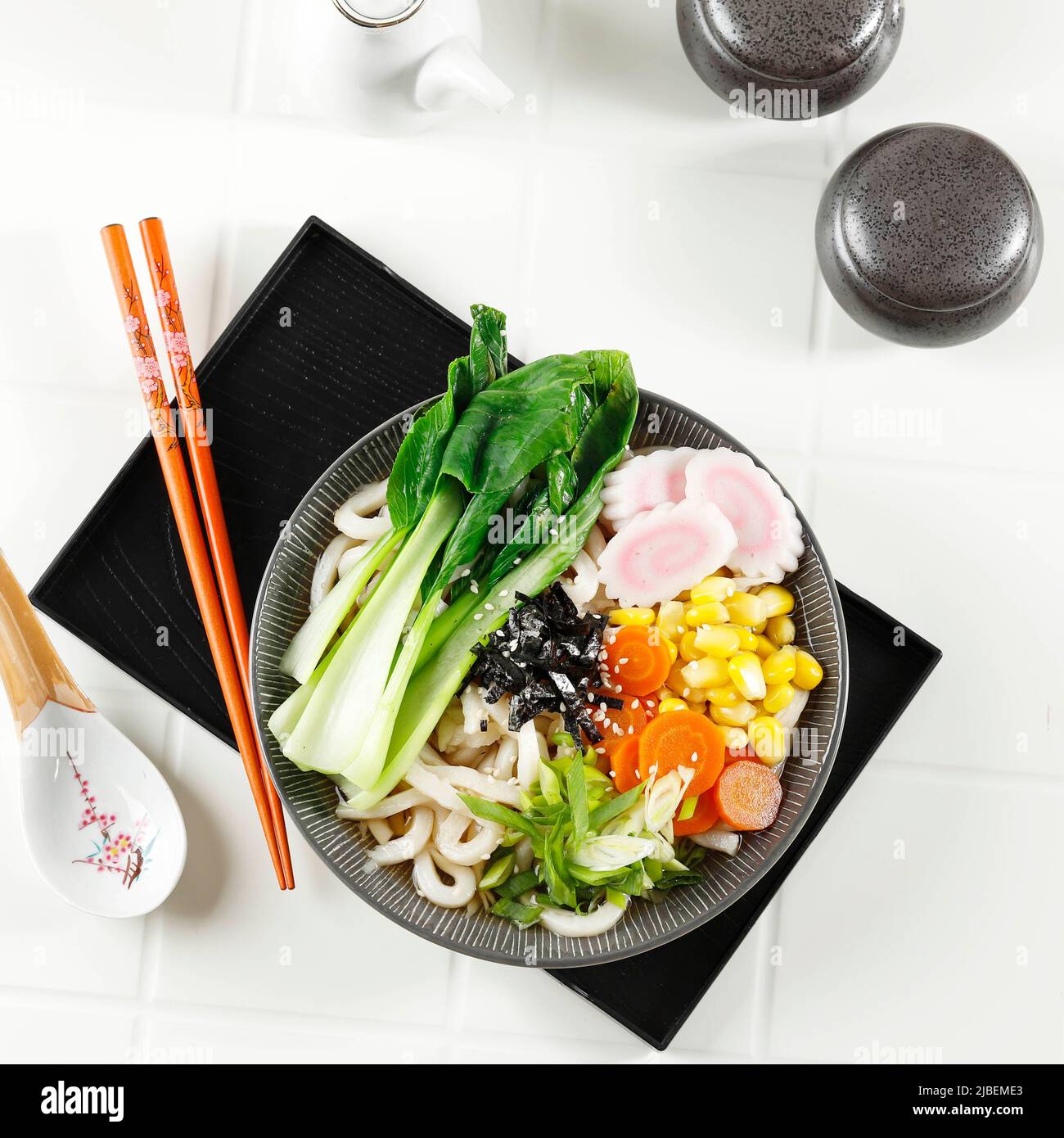 Udon, Japanese Noodles with Various Vegetables Topping, Nori Laver, and ...