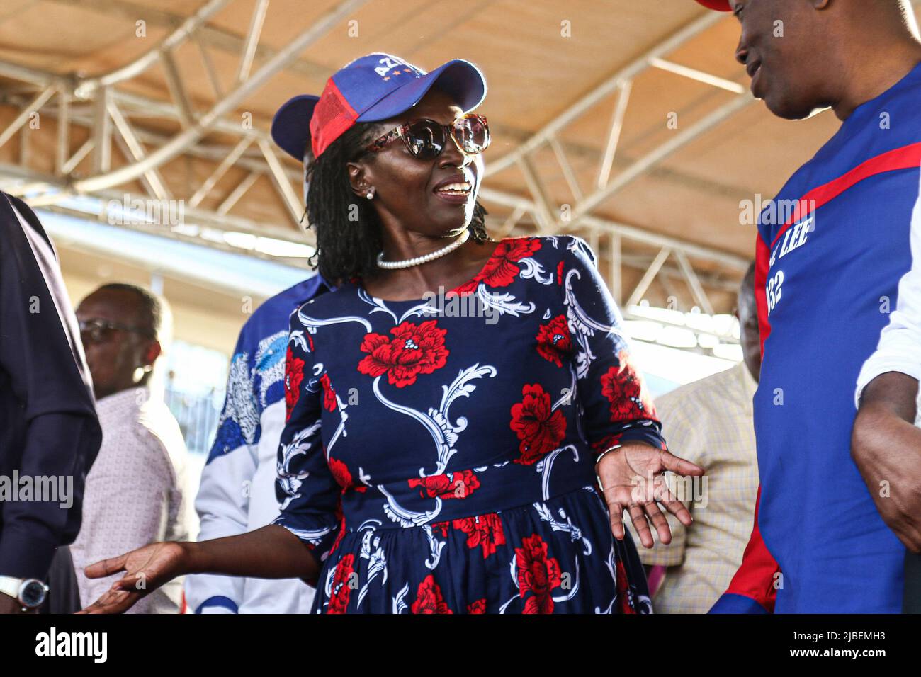 Azimio Coalition running mate, Martha Karua (L) reacts during a ...