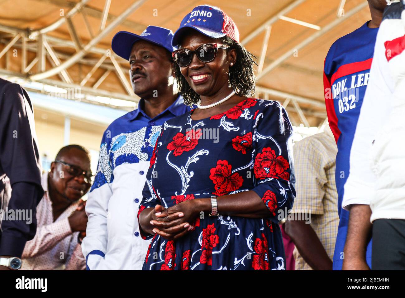 Azimio Coalition running mate, Martha Karua (C) smiles during a ...