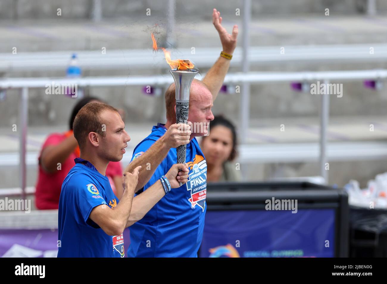 Orlando, Fl, US, June 5, 2022 Athletes carry the torch into the