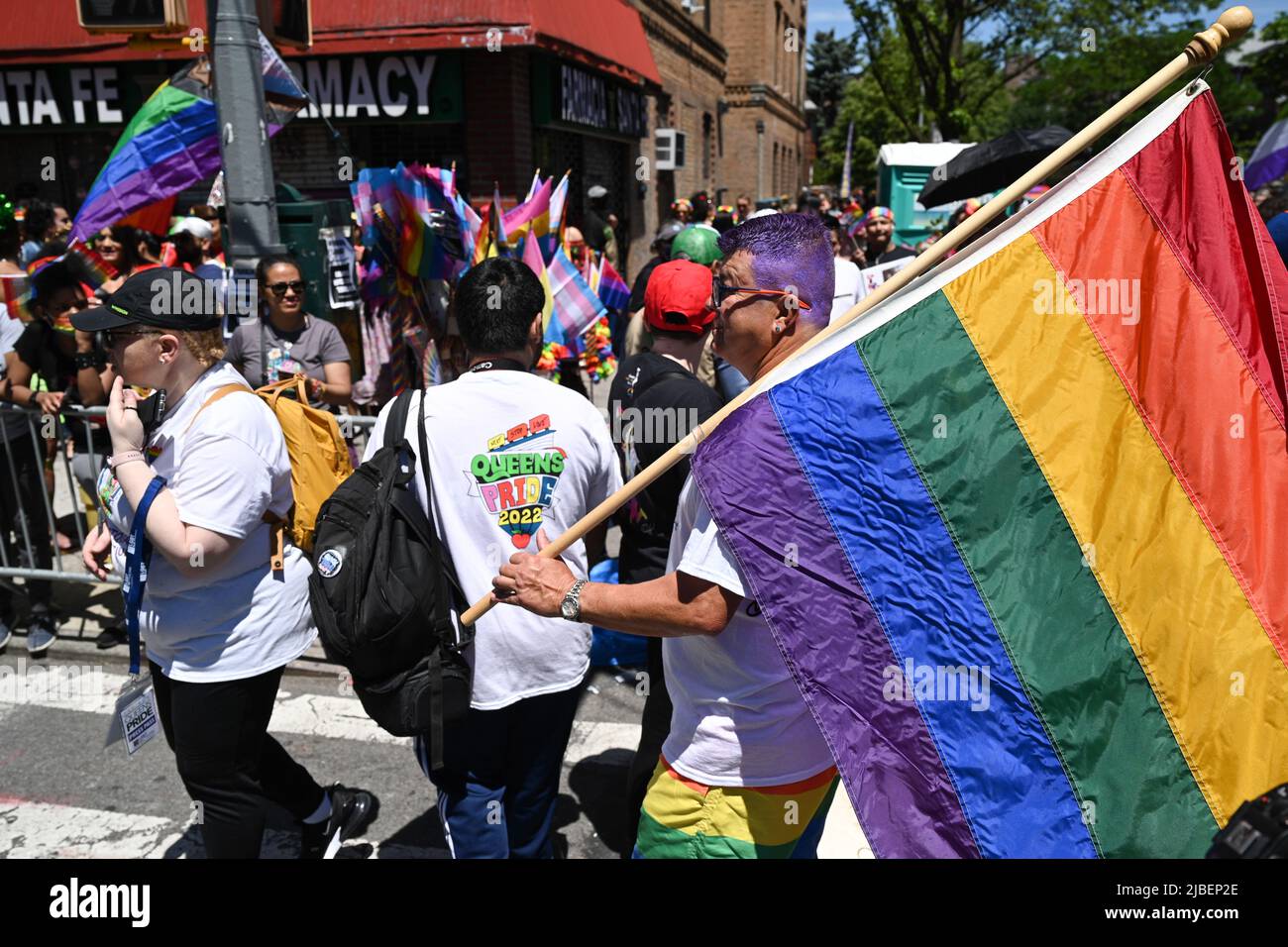 People attend the 30th Annual Queens Pride Parade on June 5, 2022 in
