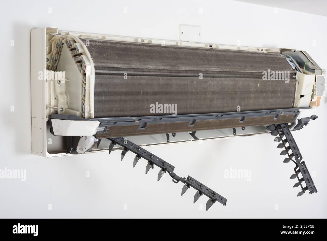 Cleaning air conditioner indoor unit. Maintaining the air conditioner concept Stock Photo Alamy