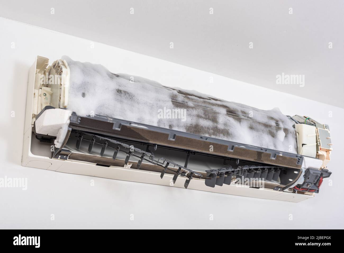 Cleaning air conditioner indoor unit. Maintaining the air conditioner