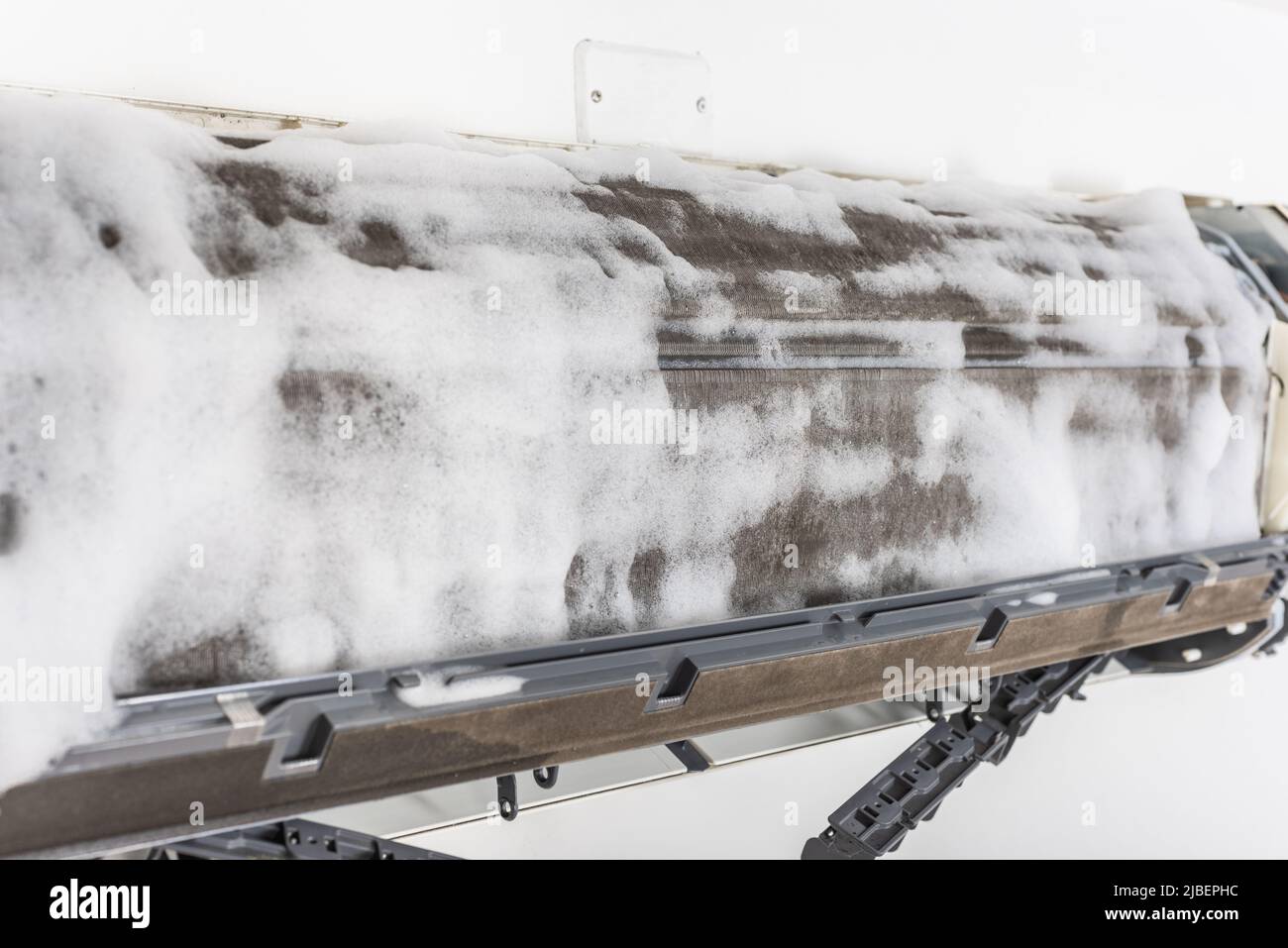 Cleaning air conditioner indoor unit. Maintaining the air conditioner