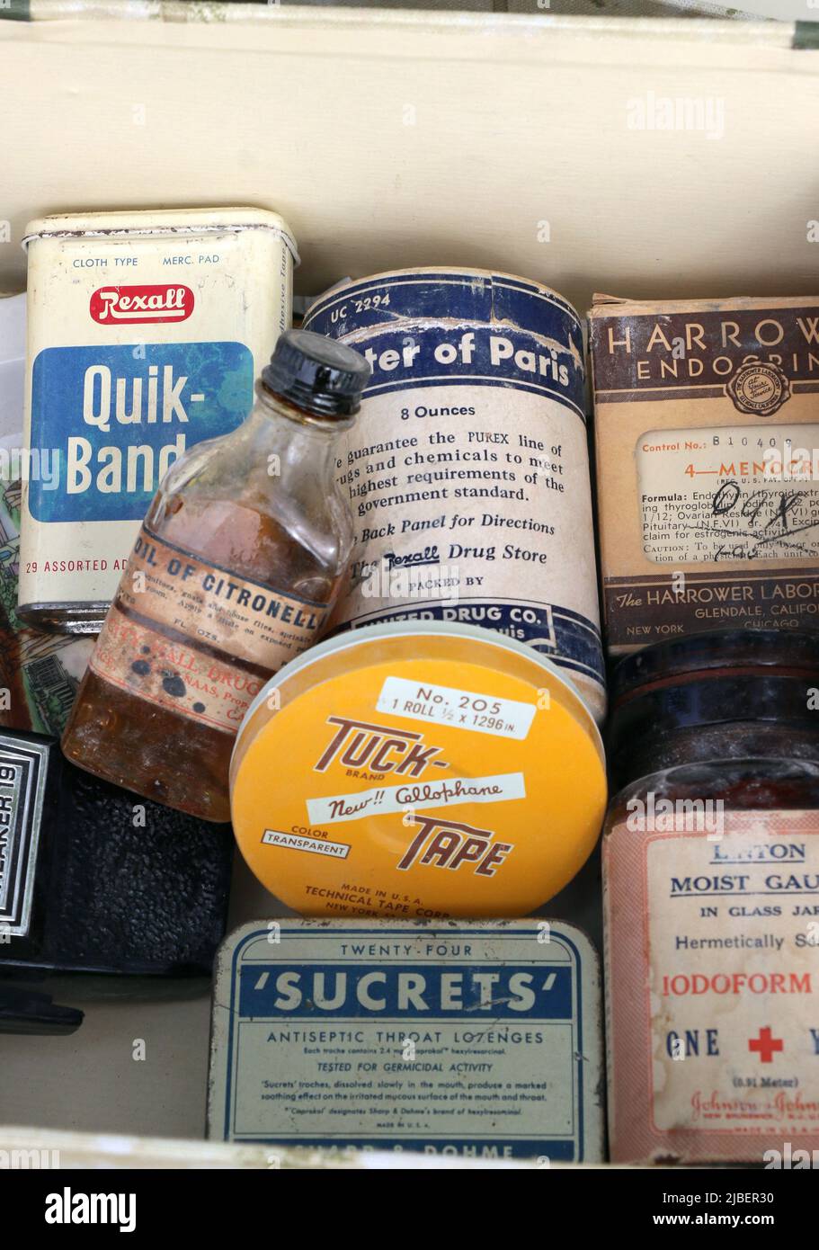 Assortment of vintage medicines in a box at an estate sale. Stock Photo