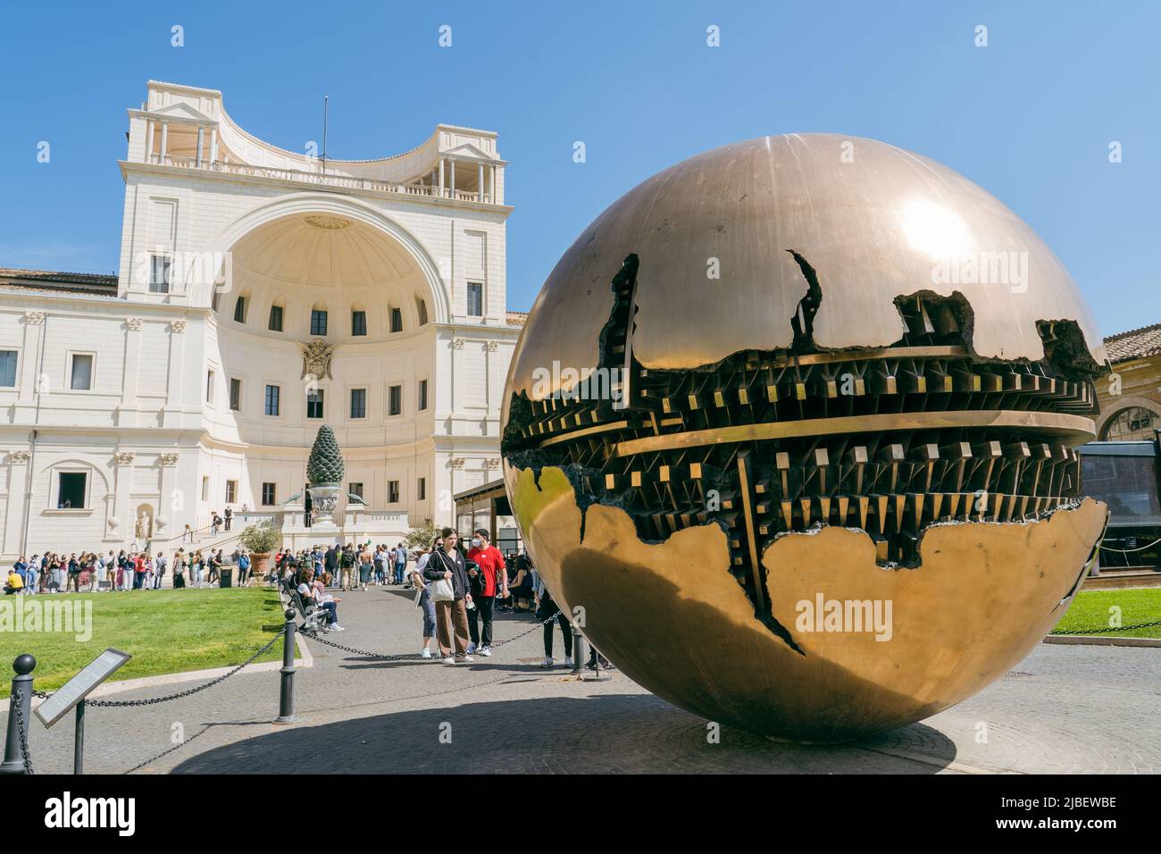 Sphere within a sphere by Arnaldo Pomodoro is the centerpiece of the Courtyard of the Pinecone at the Vatican Museum Stock Photo