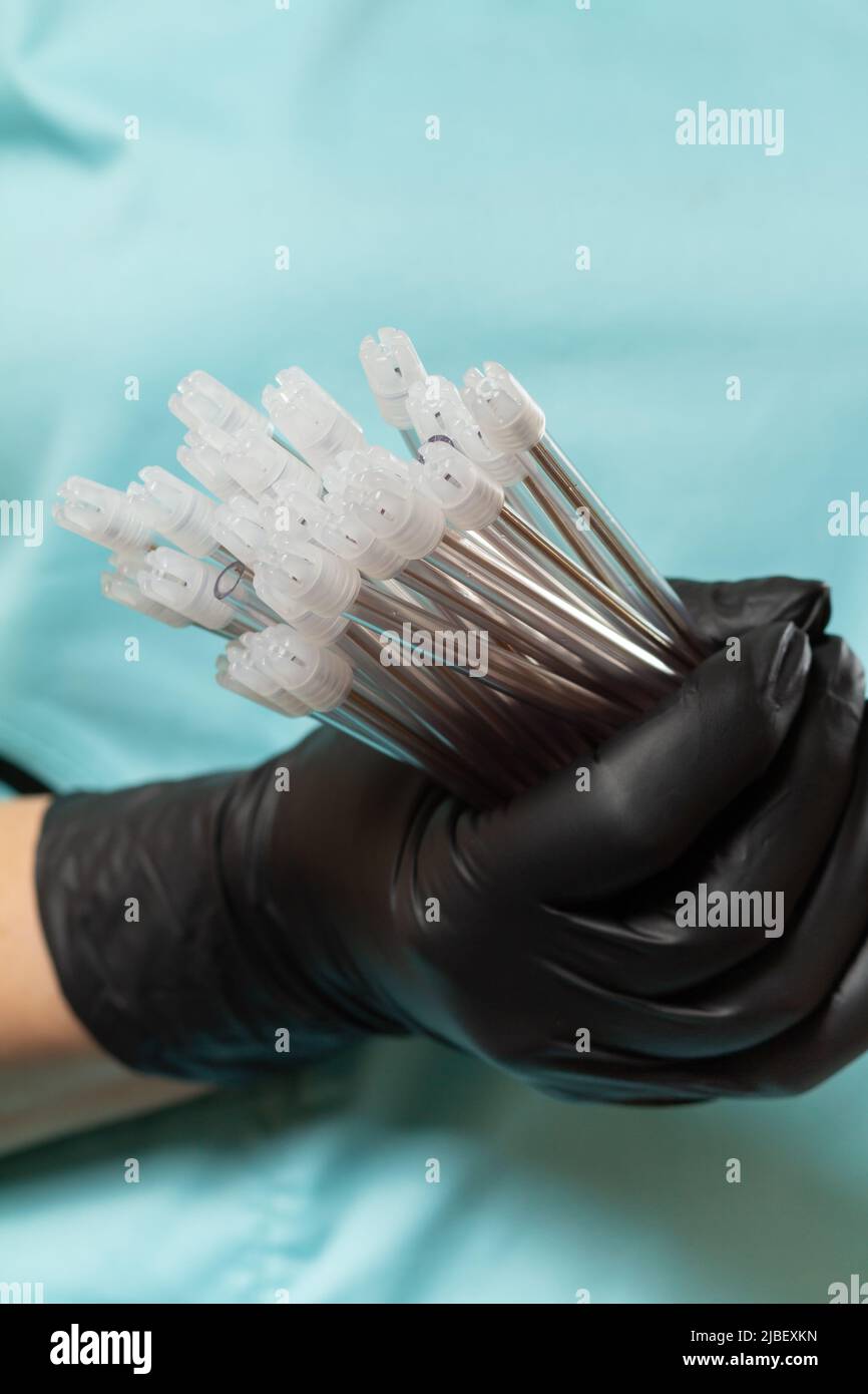 Black latex glove hi-res stock photography and images - Alamy