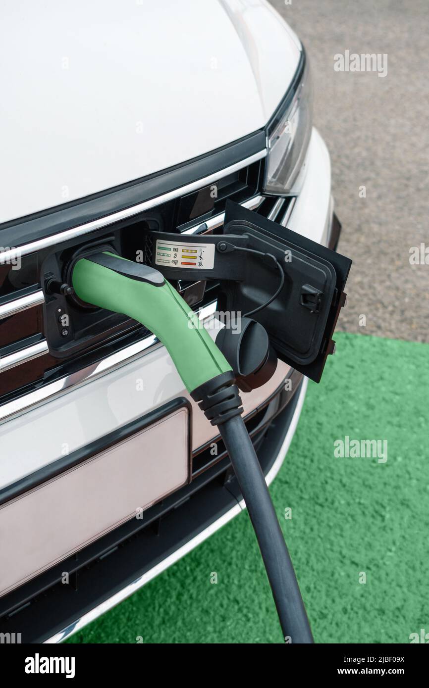 Electric vehicle charging socket hires stock photography and images