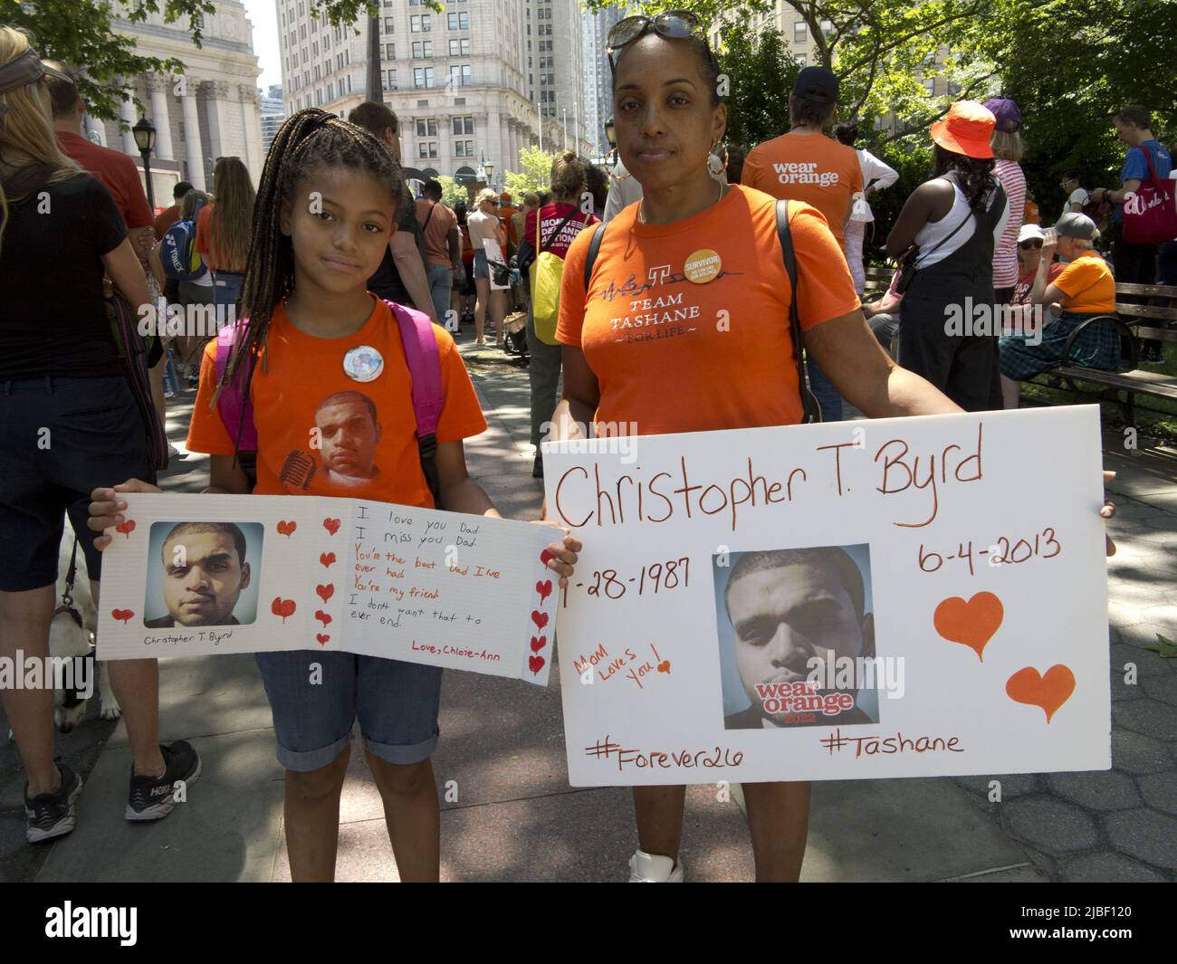 Moms Demand Action for Gun Sense rally on June 4, 2022 at Foley Square in NYC. Family of gun victim carry his photo on the anniversary of his death. Stock Photo