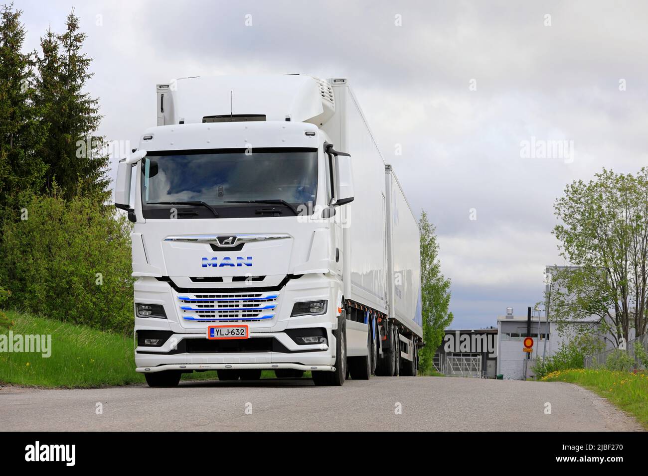 New, white Volvo FMX heavy duty truck for construction parked on a yard.  Front view, detail. Forssa, Finland. June 10, 2022 Stock Photo - Alamy