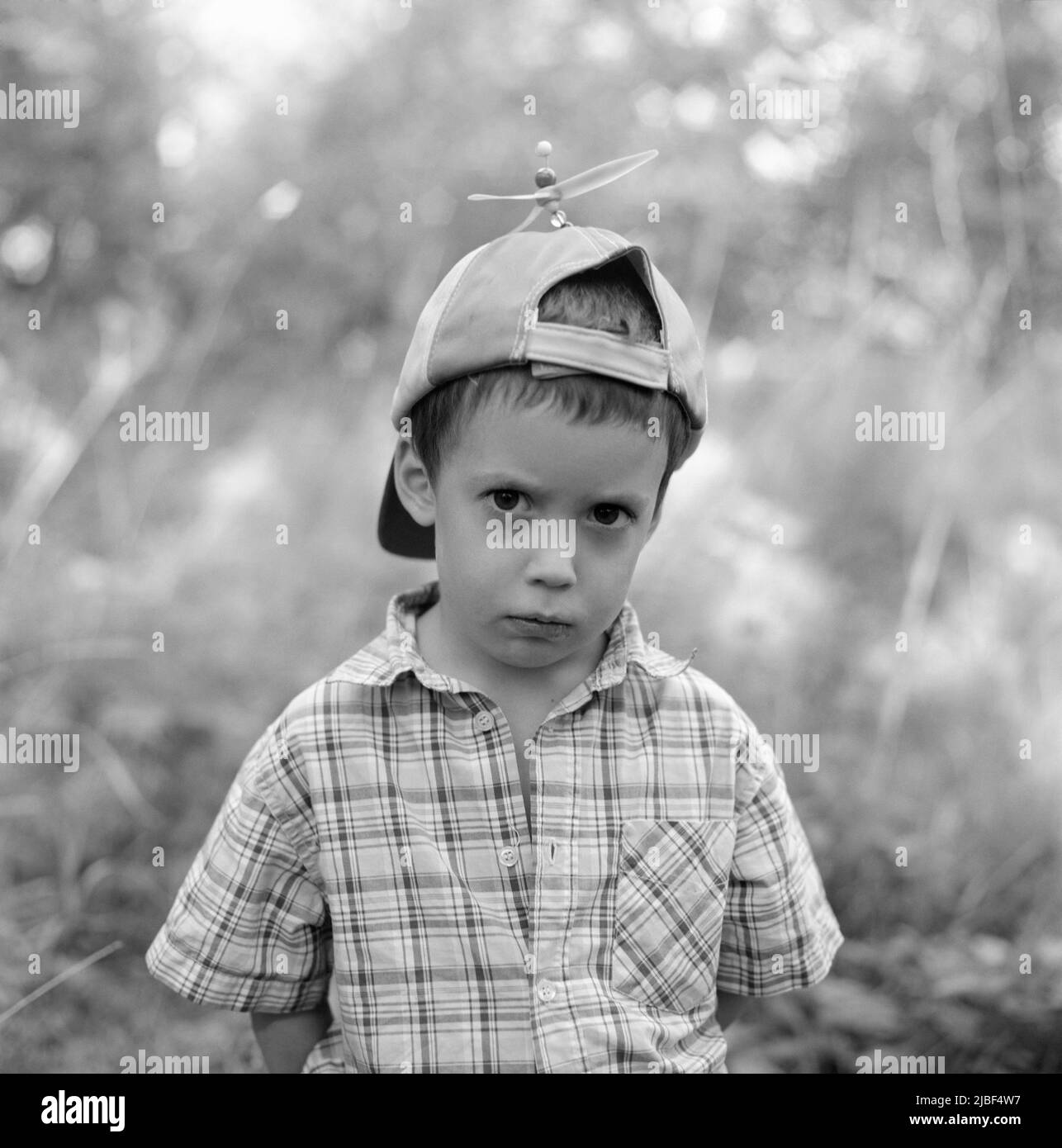 Portrait of boy in propeller hat Stock Photo