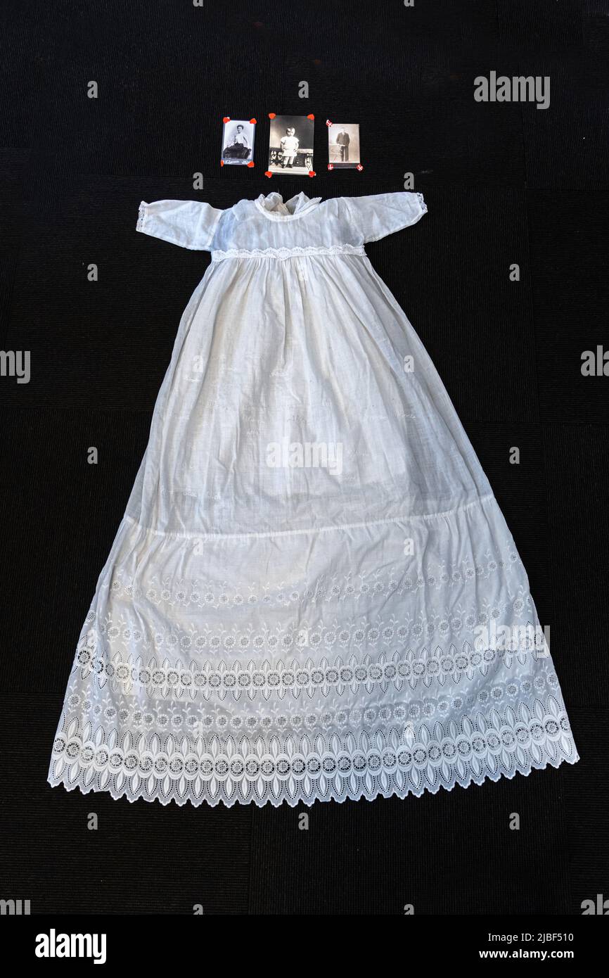 Traditional baptism dress, worn since 1915. Embroidered on the bodice are the names of the baptized who used the dress. Assens, Denmark, Europe Stock Photo