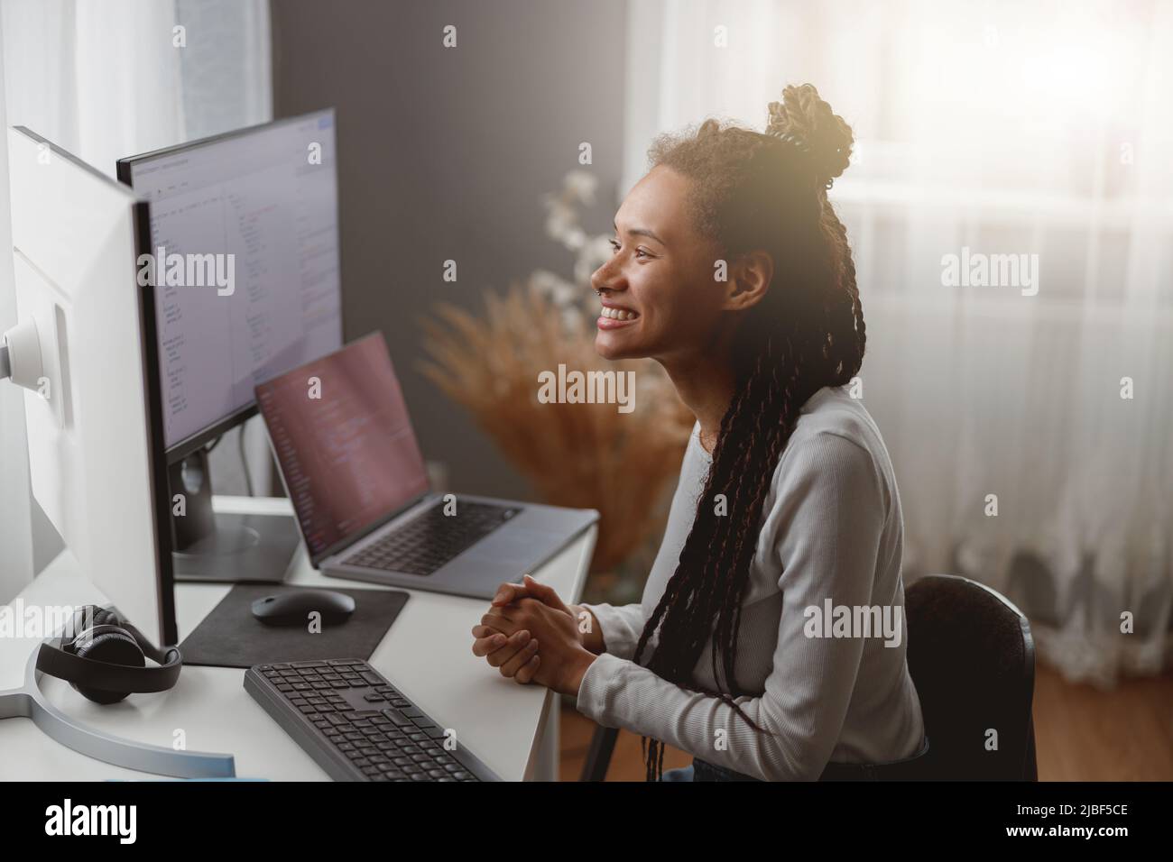 Happy smiling professional female programmer works from home, pretty IT ...