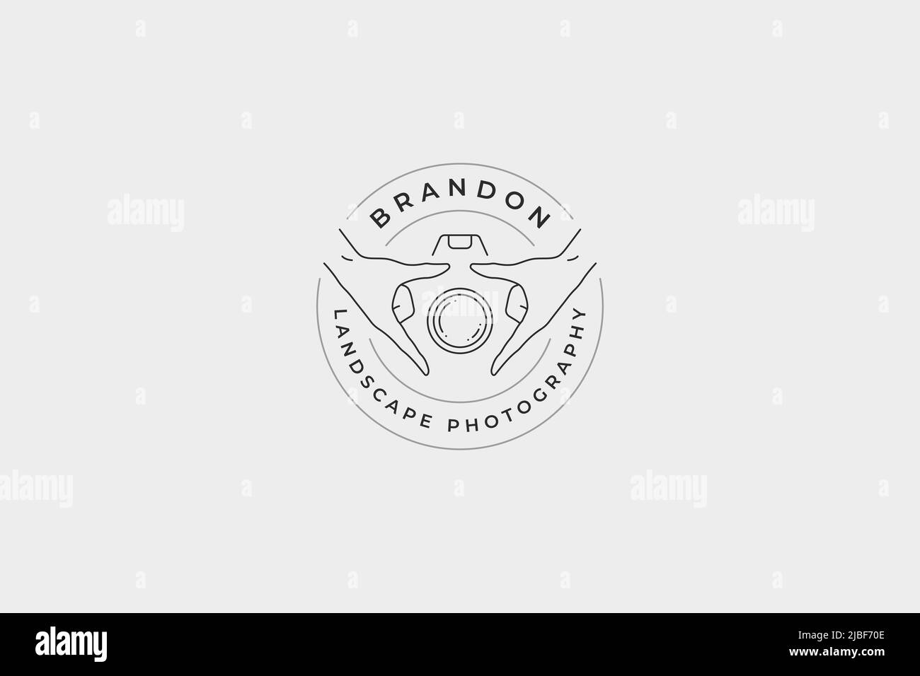 Minimalist human hands holding camera lens shutter circle line art logo with place for text vector illustration. Monochrome fashion photographer schoo Stock Vector