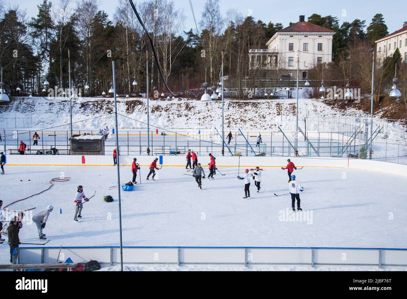 Ice hockey game at ice rink Stock Photo