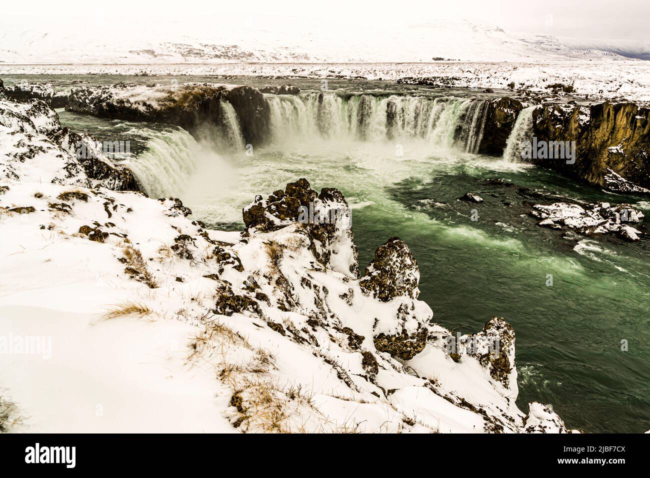Snowy Goðafoss waterfall in Iceland Stock Photo