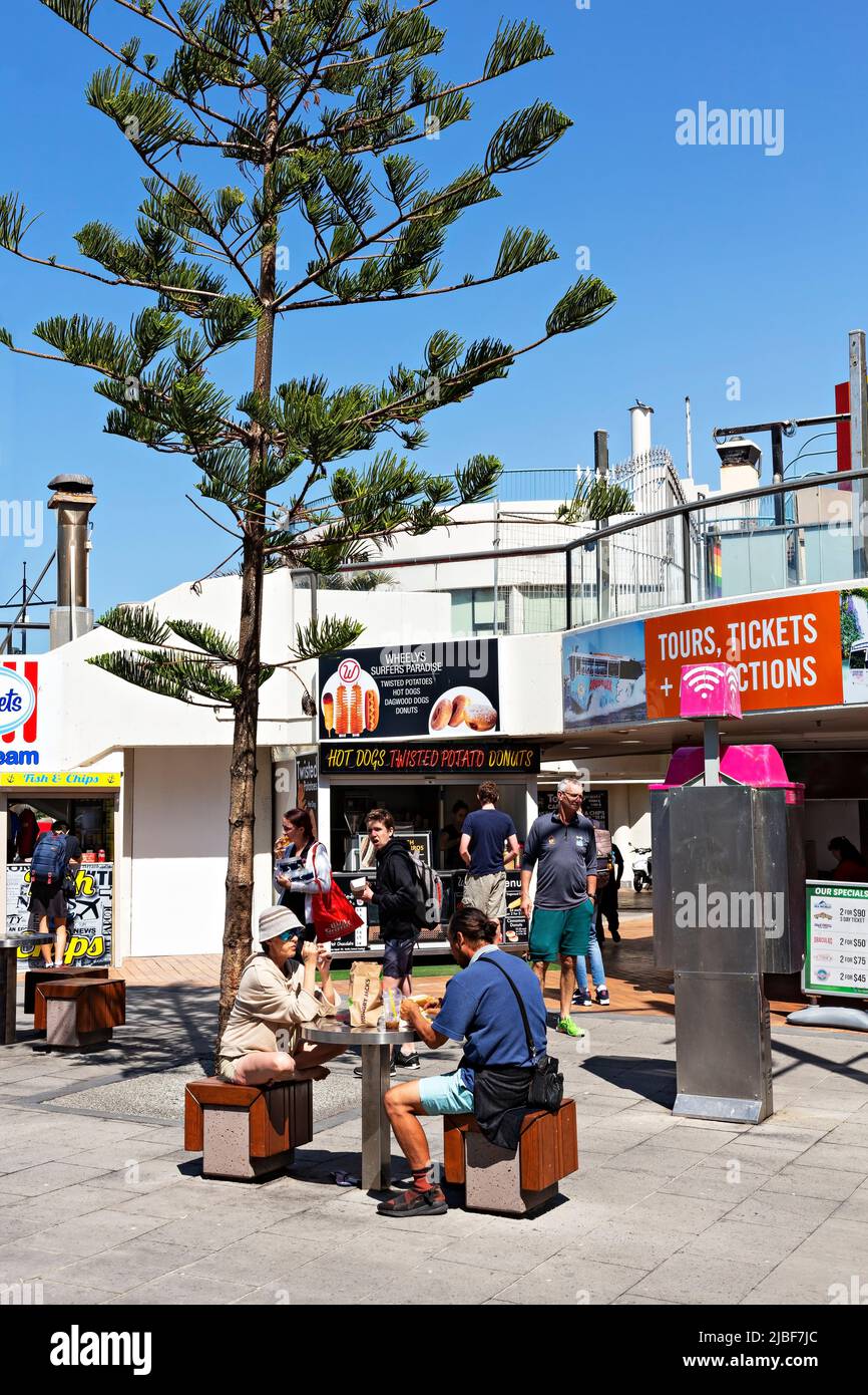 Queensland Australia /  Tourists eating take away food  in Surfers Paradise. Stock Photo