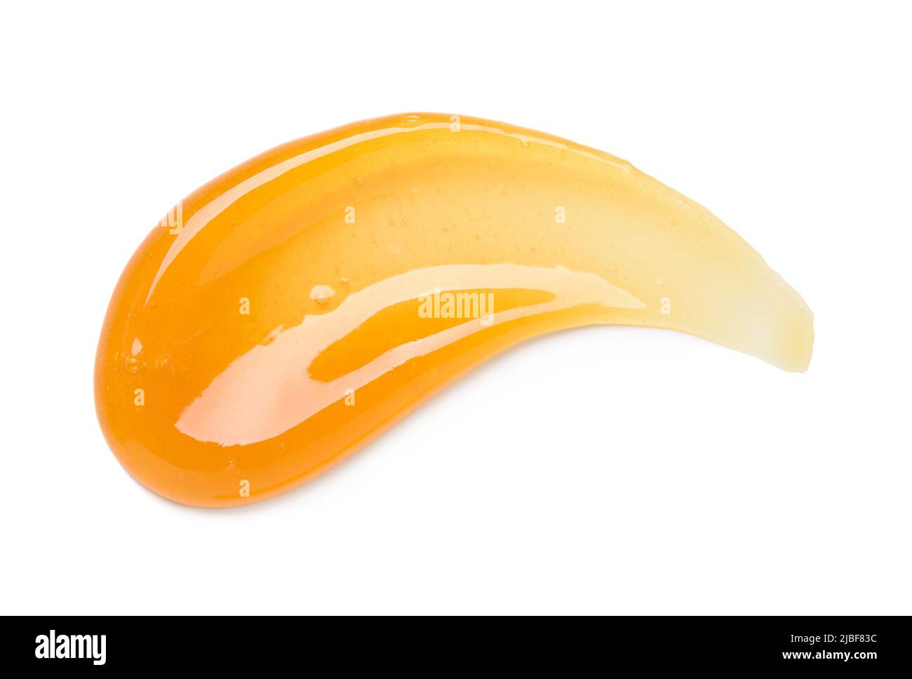 Clear orange gel smear curve with bubbles isolated on white background