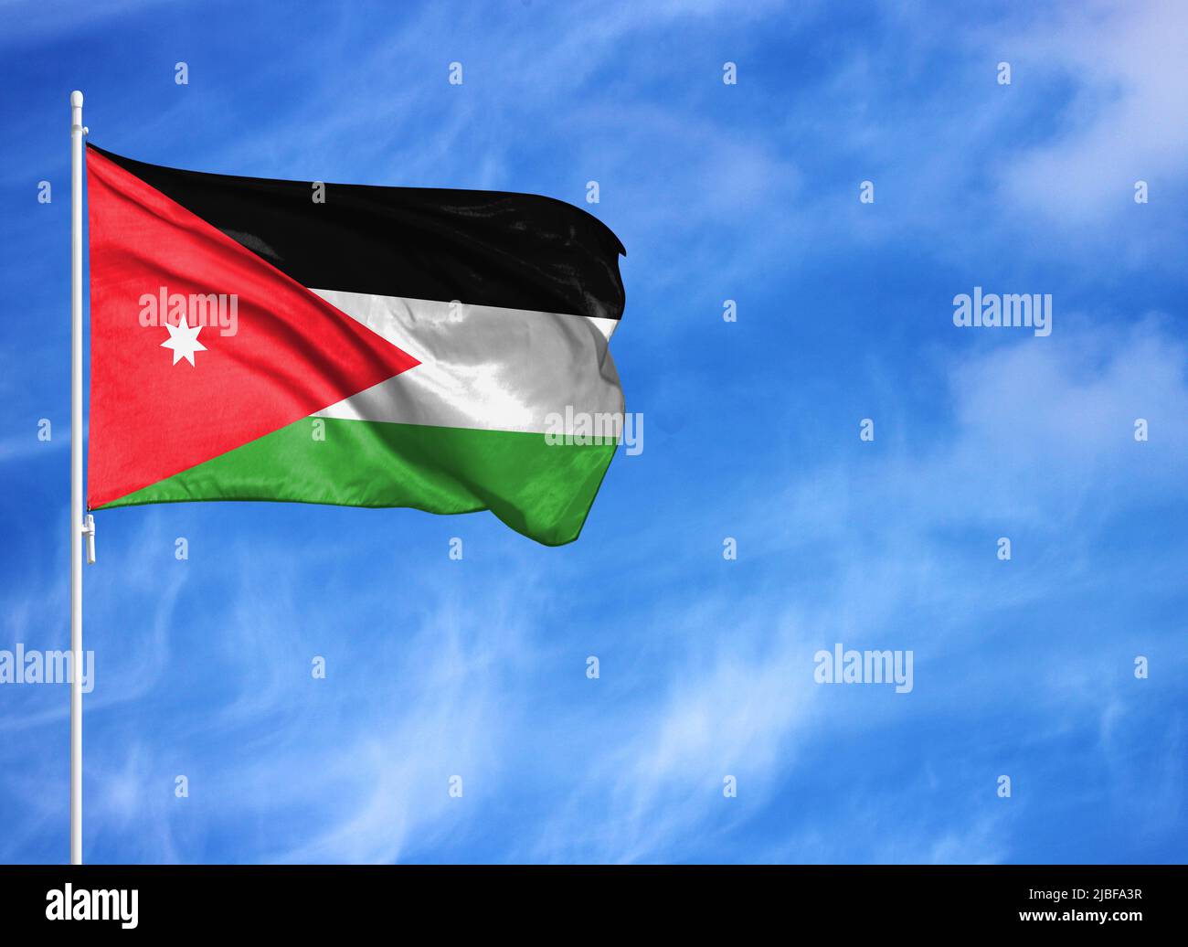 National flag of Jordan on a flagpole Stock Photo Alamy