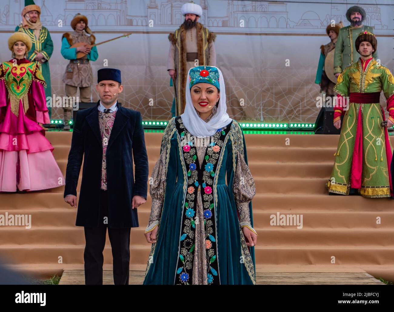 Bolgar, Tatarstan, Russia. May 21, 2022. Tatar National Ensemble dances and sings at the Folklore Festival. Tatars in national costumes. Ethnics and traditional arts concept. Stock Photo