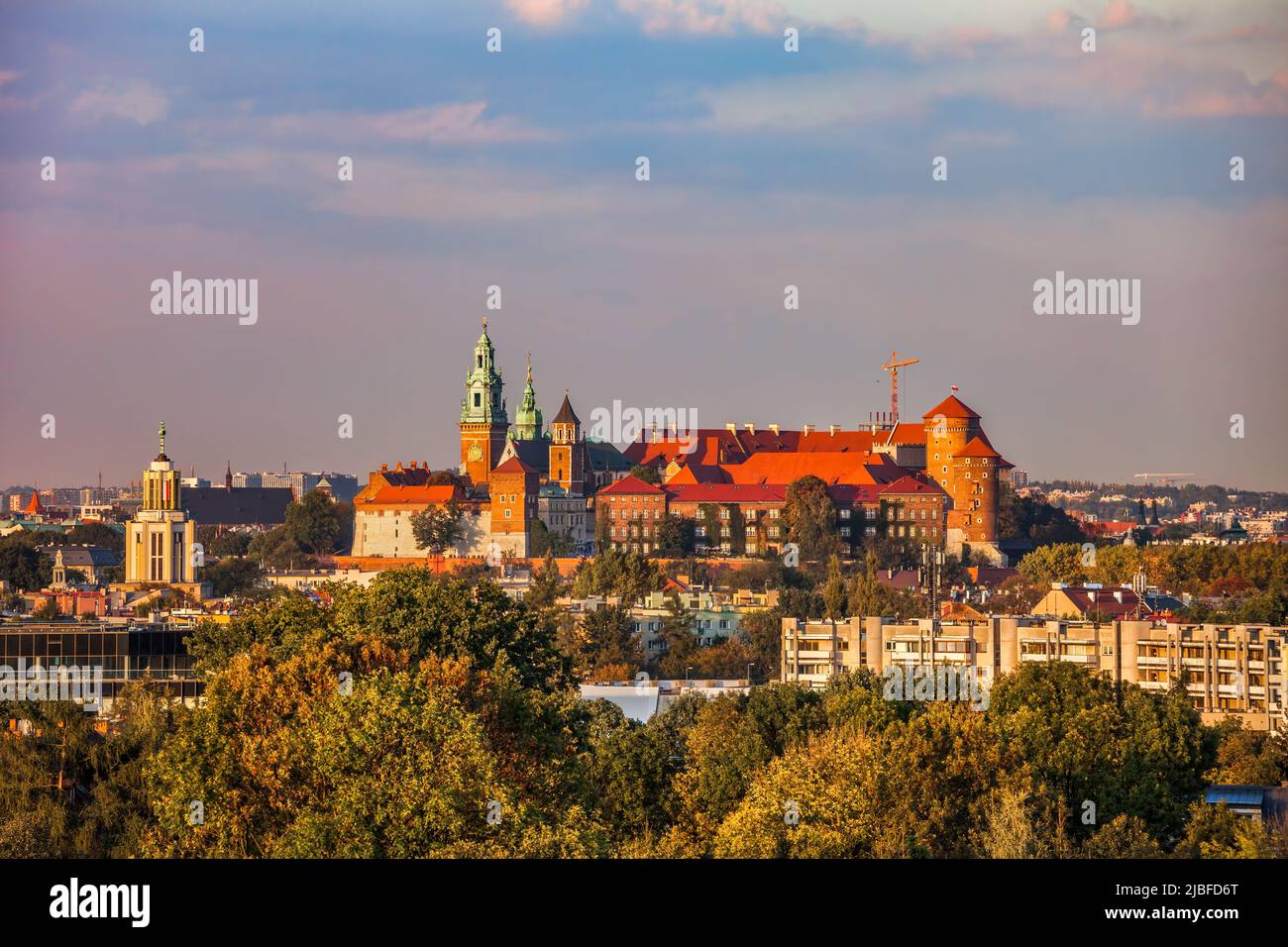 City of Krakow in Poland. Cityscape with the Wawel Royal Castle at sunset. Stock Photo