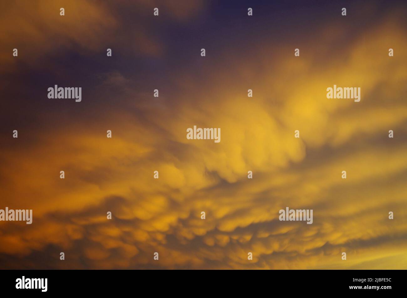 Mammatus Clouds after an Thunderstorm in a Evening. Stock Photo