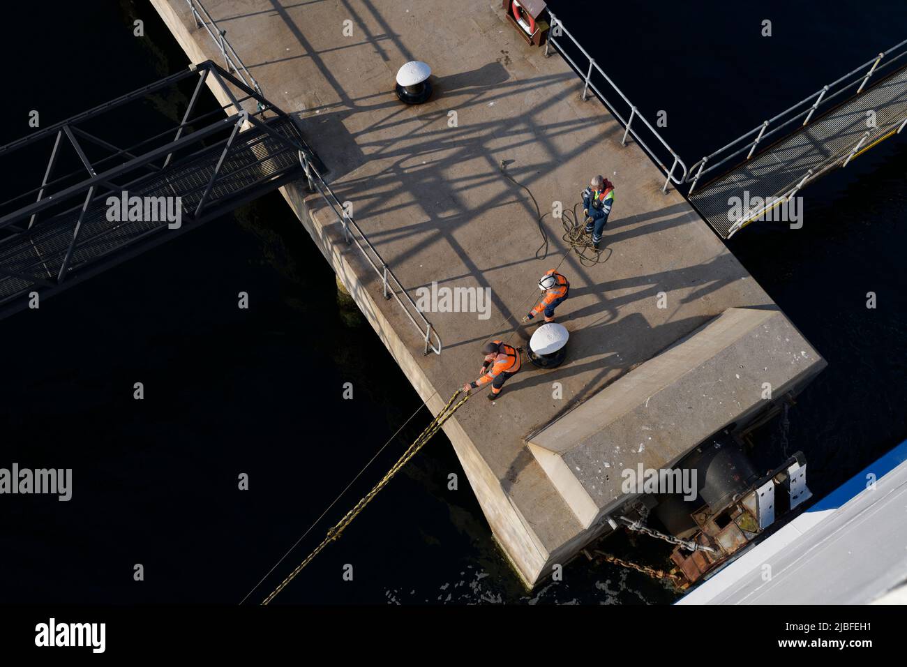 High angle view of workers on dock Stock Photo
