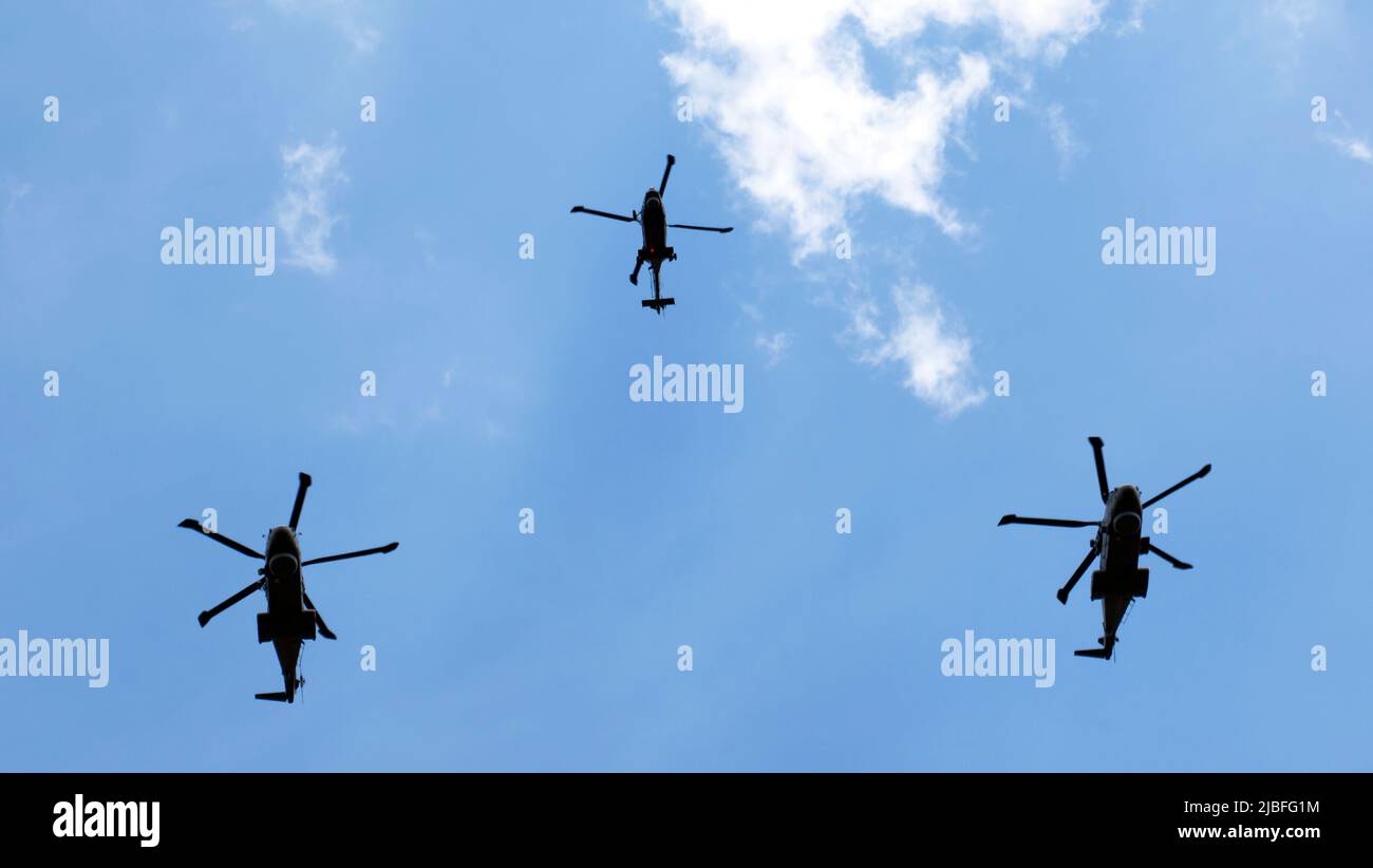 A Formation of one Wildcat (Royal Navy) and two Merlin (Royal Navy) Helicopters, fly over Admiralty Arch, as the first element of the fly-past to celebrate Her Majesty The Queen's Platinum Jubilee 2022 Stock Photo