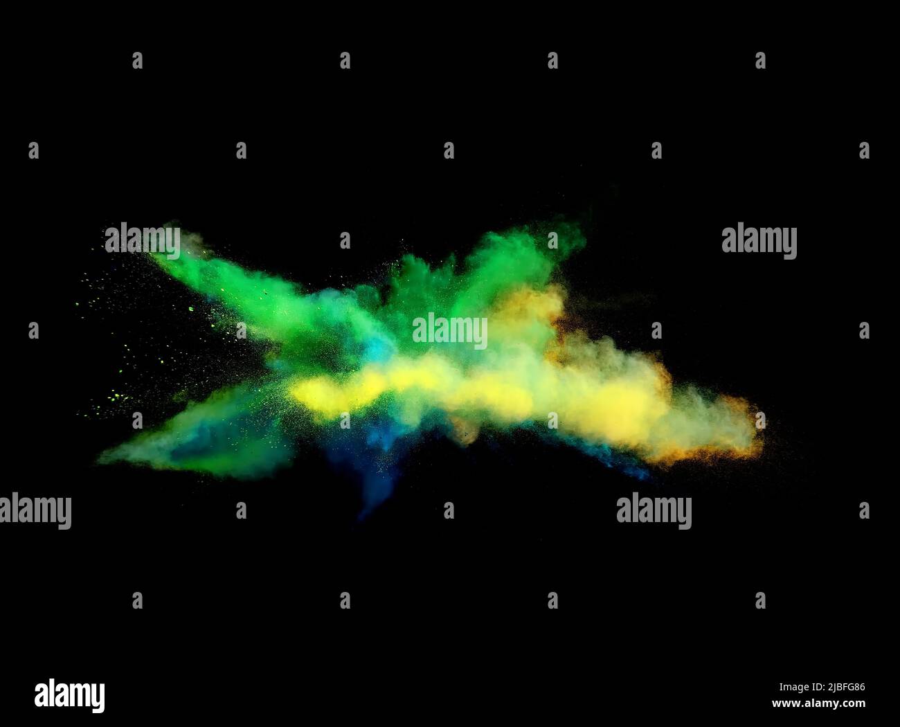Various multicolored forms of powder paint explode in front of a black ...