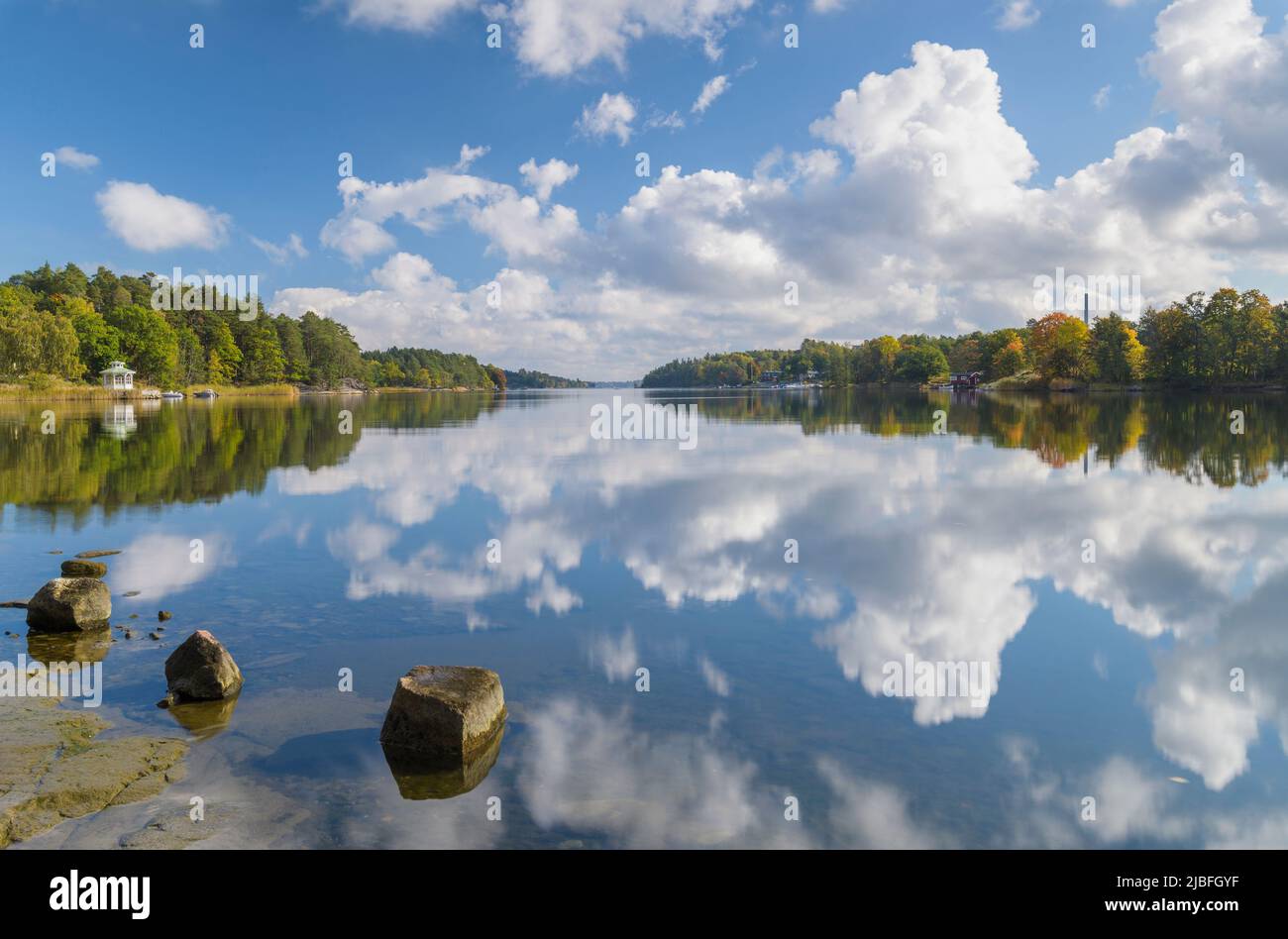 Reflection of clouds in lake Stock Photo