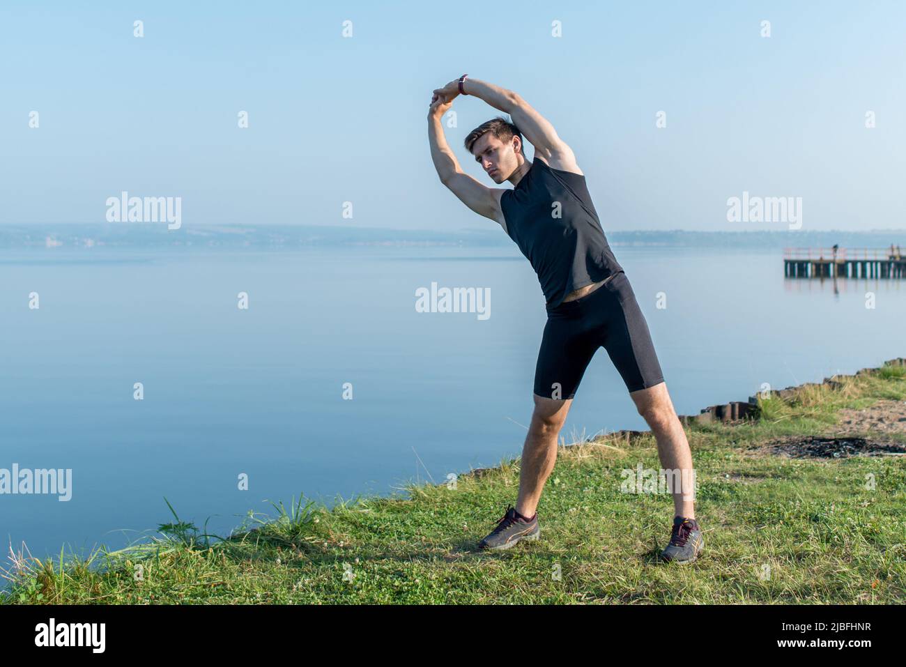 Muscular man outstretched arms hi-res stock photography and images - Alamy
