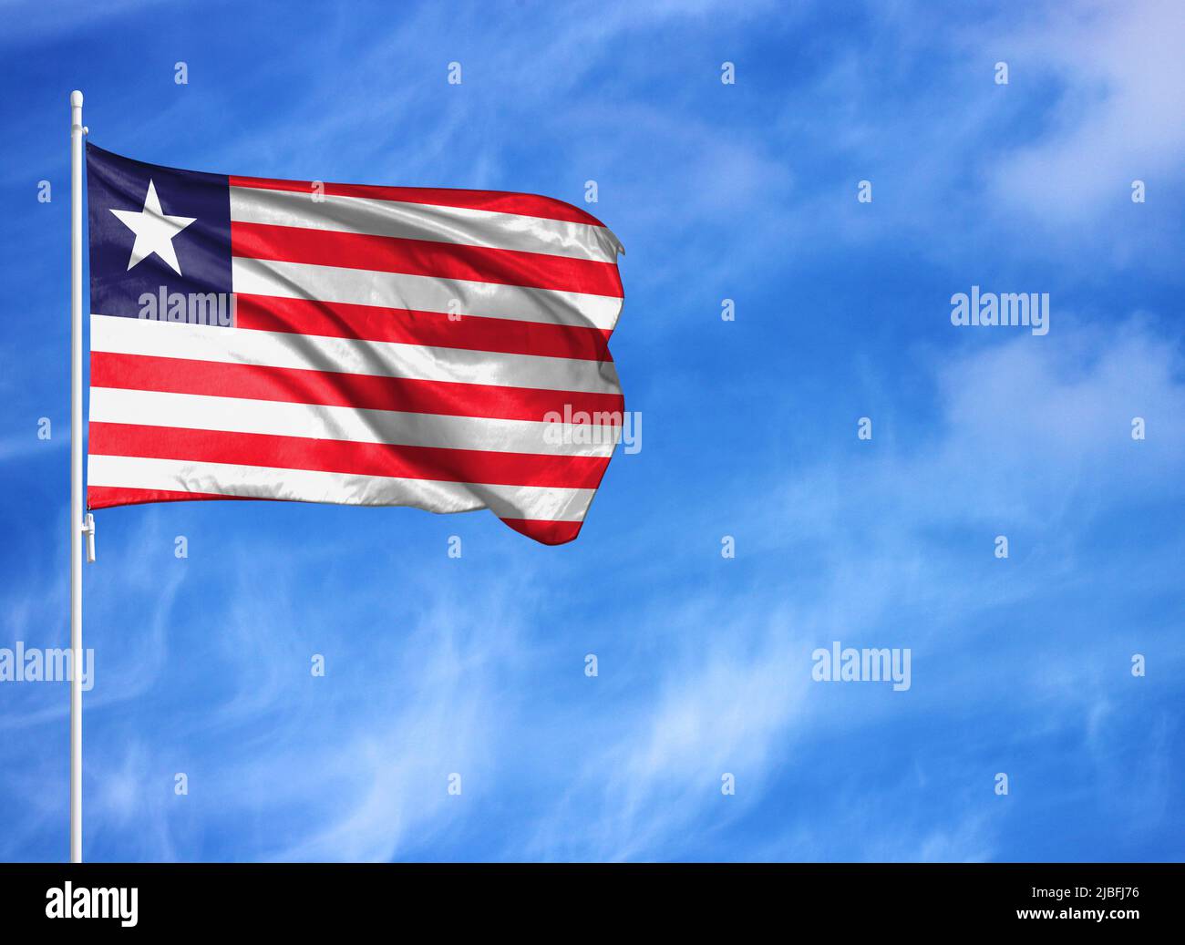 National flag of Liberia on a flagpole Stock Photo - Alamy