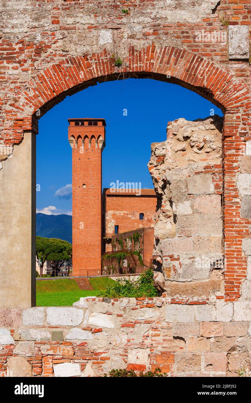 Pisa 'Old Citadel' medieval tower, seen through city walls ruins Stock Photo