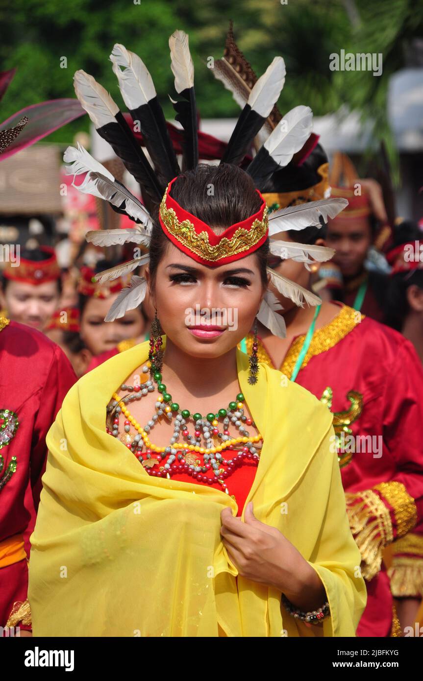 Jakarta, Indonesia - April 28, 2013 : Dayak women from Borneo, Kalimantan, wear traditional clothes at the Dayak festival in Jakarta, Indonesia Stock Photo