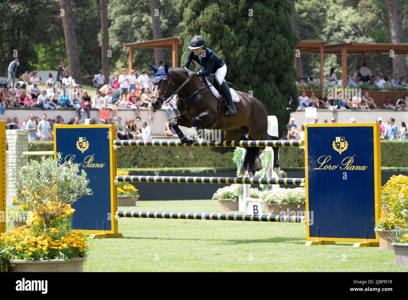 Rome, Italy,May 28, 2022 - A rider jumps over an obstacle riding a ...
