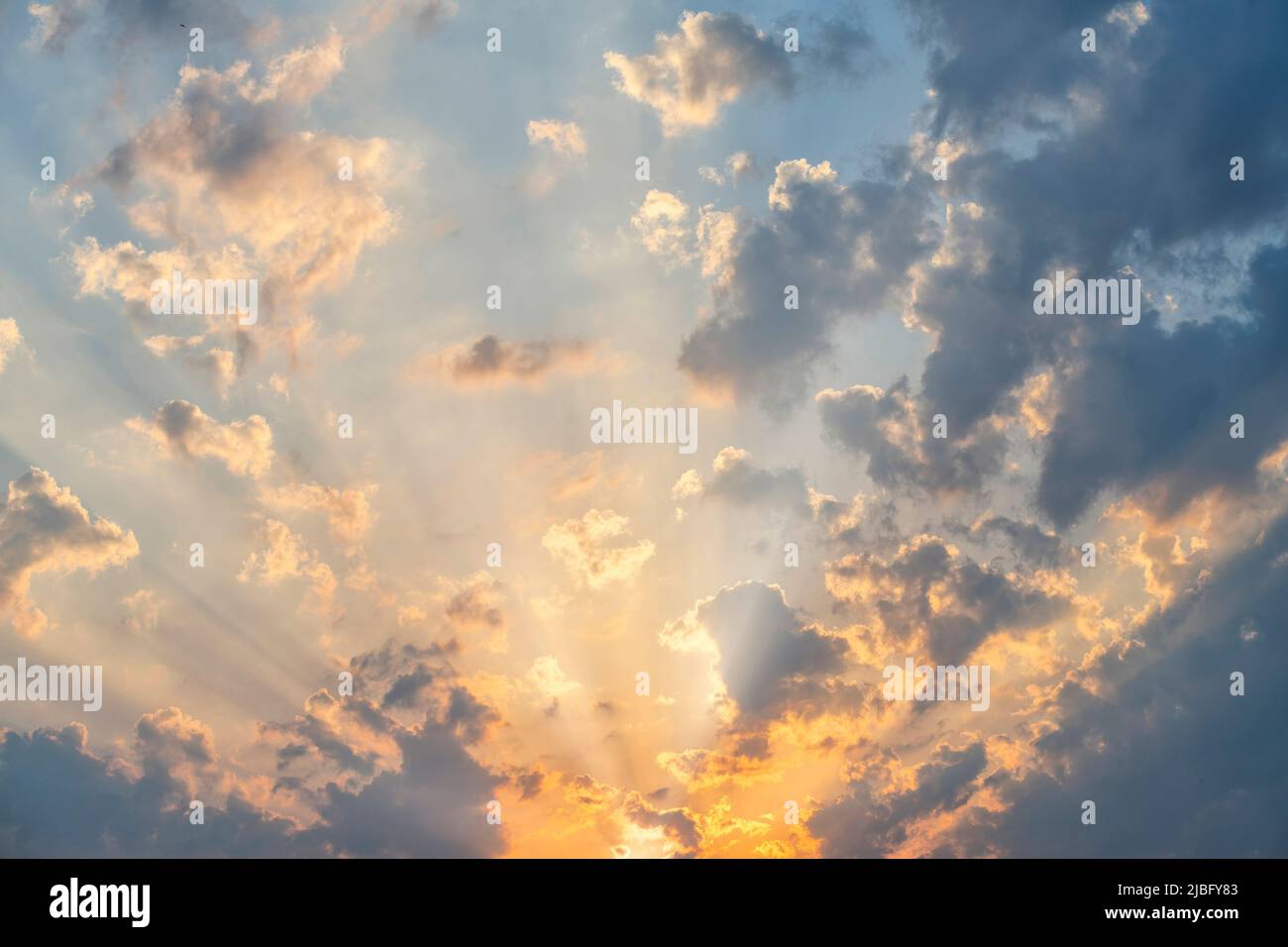 Clouds in sky at sunrise Stock Photo