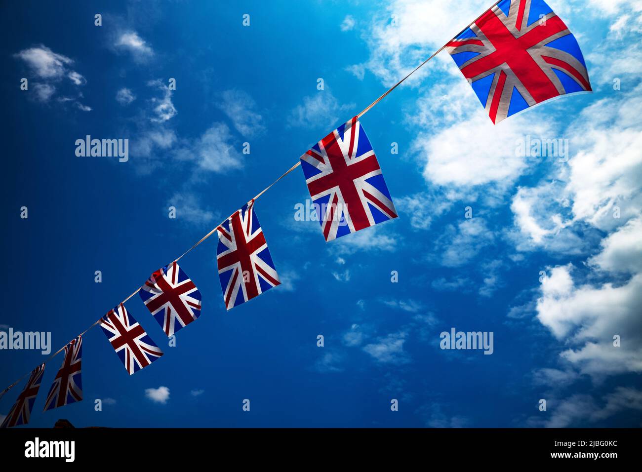 Thaxted Essex UK. Platinum Jubilee Union Jack Flags flying June 2022 Stock Photo